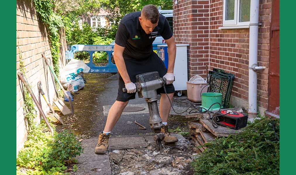 Digging to the damaged drain