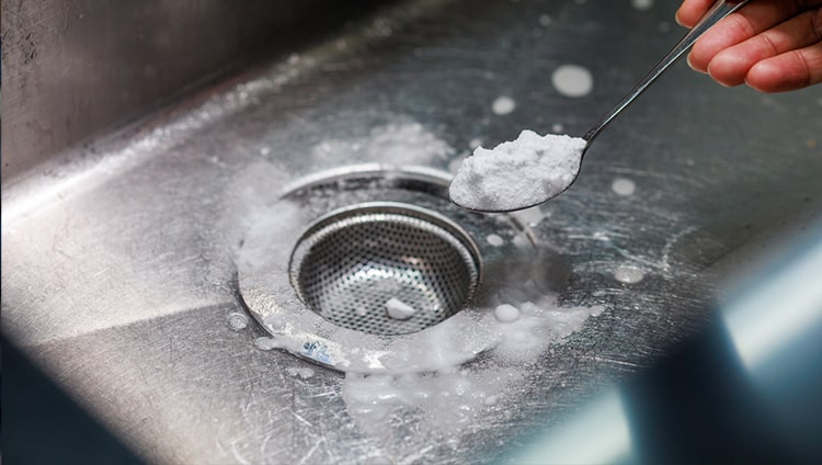 white vinegar and baking soda down drain